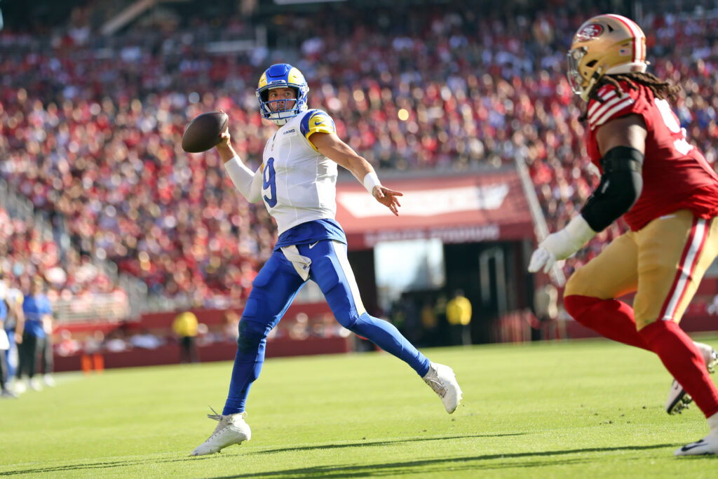 Los Angeles Rams' Matthew Stafford rolls out while throwing a 2nd quarter touchdown to Davis Allen against San Francisco 49ers during NFL game at Levi's Stadium in Santa Clara on Sunday, November 9, 2025.