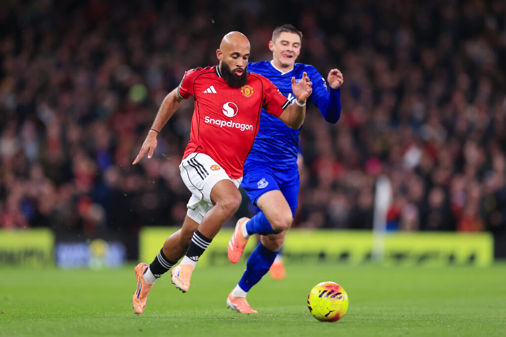 Bryan Mbeumo of Manchester United battles with Vitaliy Mykolenko of Everton during the Premier League match between Manchester United and Everton at Old Trafford.