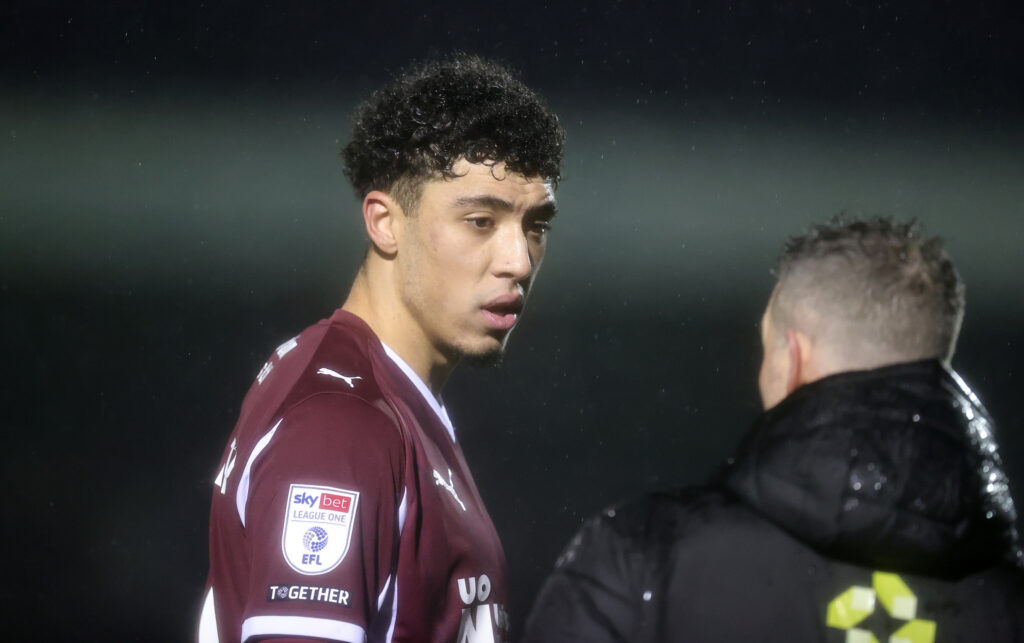 Ethan Wheatley of Northampton Town talks to 4th official George Laflin during the Sky Bet League One match between Northampton Town and Cardiff City at Sixfields.