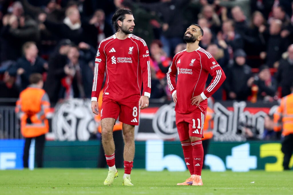 Dominik Szoboszlai and Mohamed Salah of Liverpool react after the UEFA Champions League 2025/26 League Phase MD5 match between Liverpool FC and PSV Eindhoven at Anfield.