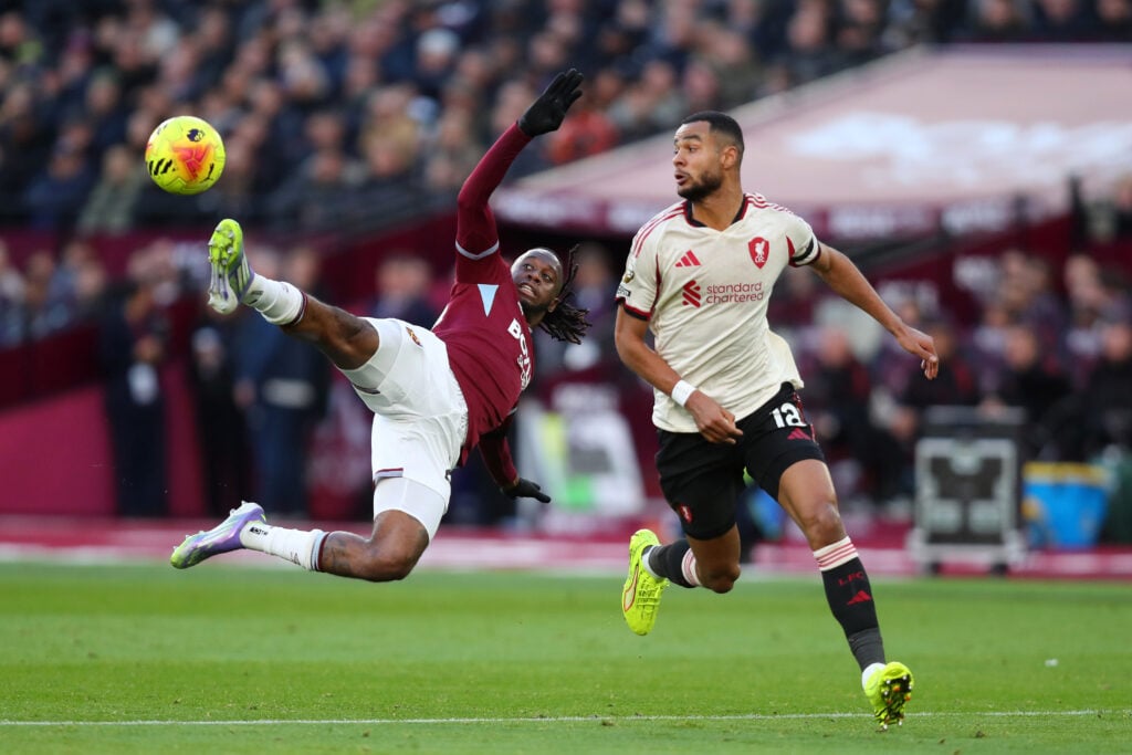 Aaron Wan-Bissaka of West Ham United and Cody Gakpo of Liverpool during the Premier League match between West Ham United and Liverpool at London Stadium.