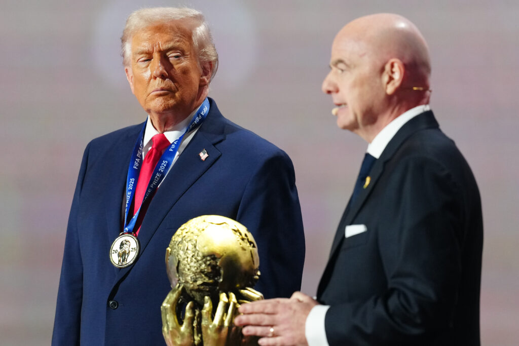 U.S. President Donald Trump receives the FIFA Peace Prize from Gianni Infantino, President of FIFA, during the FIFA World Cup 2026 Official Draw at John F. Kennedy Center for the Performing Arts on December 05, 2025 in Washington, DC.