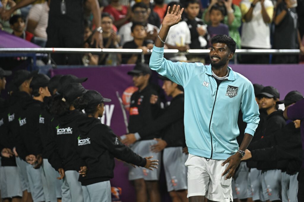 Dhakshineswar Suresh waves to the crowd in India