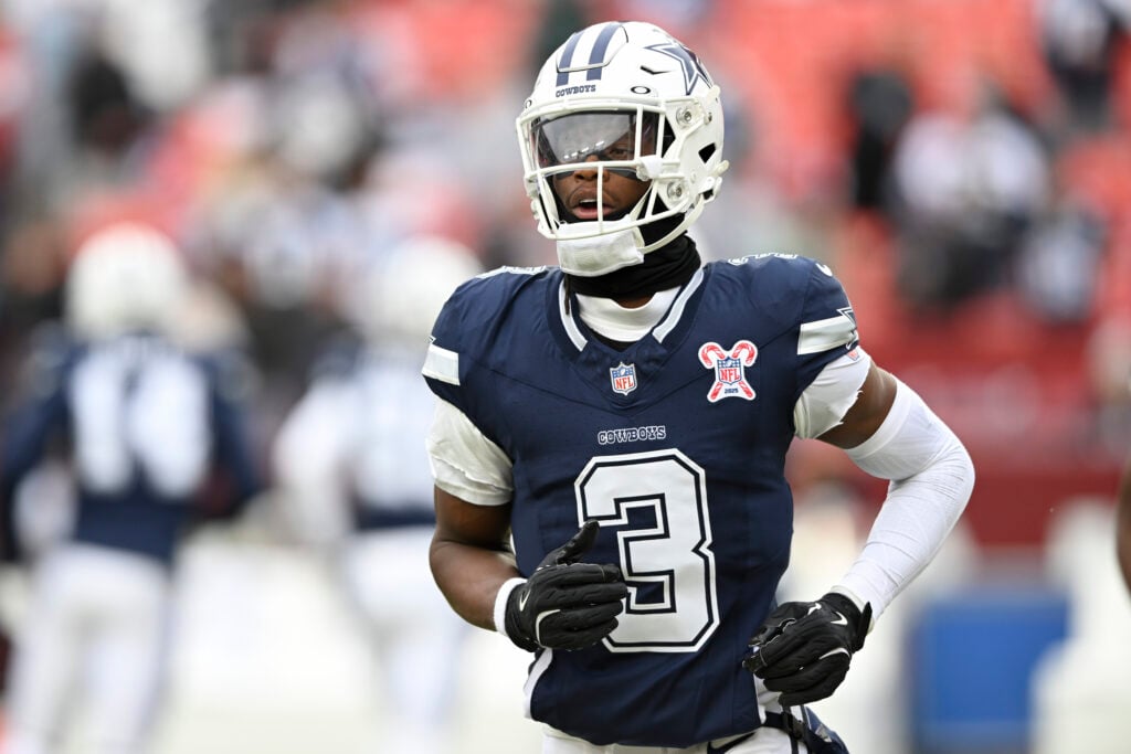 George Pickens #3 of the Dallas Cowboys warms up prior to a game against the Washington Commanders at Northwest Stadium on December 25, 2025 in Landover, Maryland.