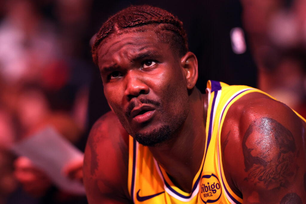 Deandre Ayton #5 of the Los Angeles Lakers sits on the bench during a time out in the second half against the Phoenix Suns at Mortgage Matchup Center.