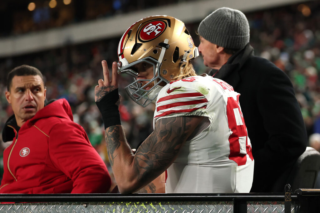 George Kittle #85 of the San Francisco 49ers is carted off the field during the second quarter in the NFC Wild Card Playoff game against the Philadelphia Eagles at Lincoln Financial Field.