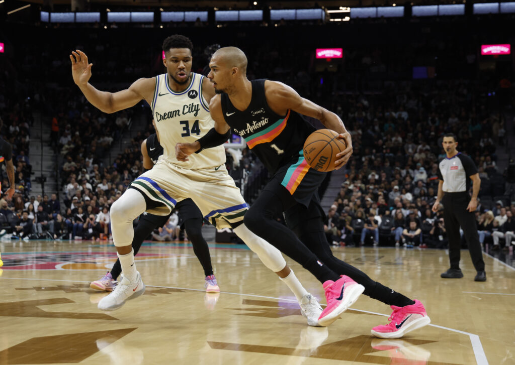 Victor Wembanyama #1 of the San Antonio Spurs makes a move against Giannis Antetokounmpo #34 of the Milwaukee Bucks in the first half at Frost Bank Center on January 15, 2026 in San Antonio, Texas.