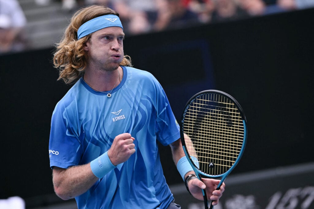 Russia's Andrey Rublev reacts after a point against Italy's Matteo Arnaldi in their men's singles match on day two of the Australian Open tennis tournament in Melbourne on January 19, 2026.