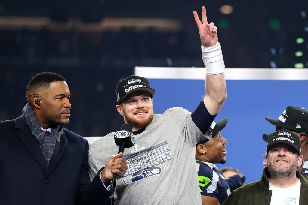 Sam Darnold #14 of the Seattle Seahawks celebrates after defeating the Los Angeles Rams 31-27 in the NFC Championship game at Lumen Field on January 25, 2026.