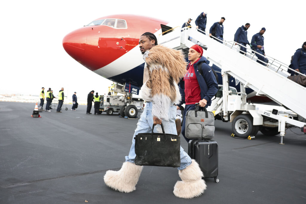 Stefon Diggs #8 of the New England Patriots arrives at San Jose Mineta International Airport ahead of Super Bowl LX on February 1, 2026.