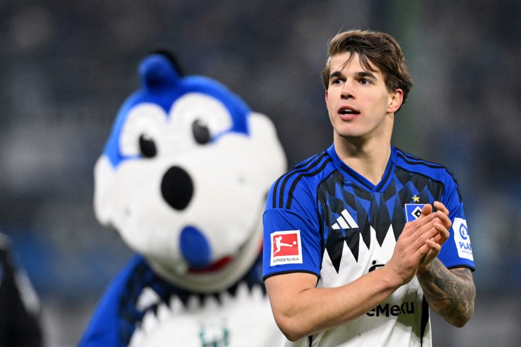 Luka Vuskovic celebrates following the team's draw in the Bundesliga match between Hamburger SV and FC Bayern München