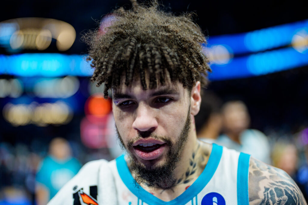 LaMelo Ball #1 of the Charlotte Hornets walks off the court after defeating the New Orleans Pelicans during their game at Spectrum Center.