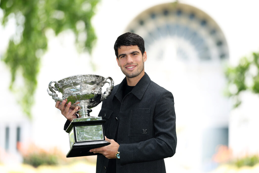 Carlos Alcaraz of Spain poses with the Norman Brookes Challenge Cup during the 2026 Australian Open Men's champion media opportunity at the Royal Exhibition Building.