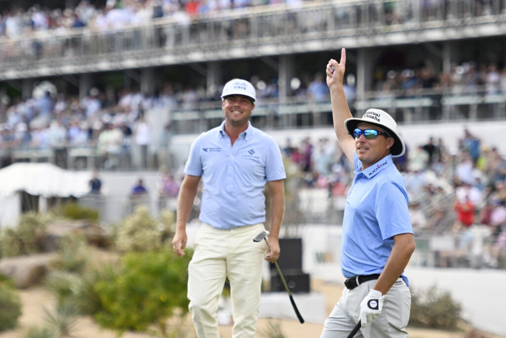 Joel Dahmen of the United States acknowledges the crowd on the 16th green during the first round of the WM Phoenix Open
