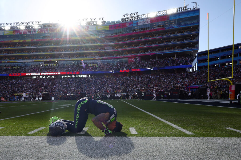 Jaxon Smith-Njigba #11 of the Seattle Seahawks prays on the field prior to Super Bowl LX between the Seattle Seahawks and the New England Patriots at Levi's Stadium on February 08, 2026 in Santa Clara, California.