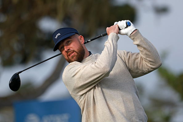 NFL player Travis Kelce plays his shot from the second tee during the second round of the AT&T Pebble Beach Pro-Am 2026 at Pebble Beach Golf Links