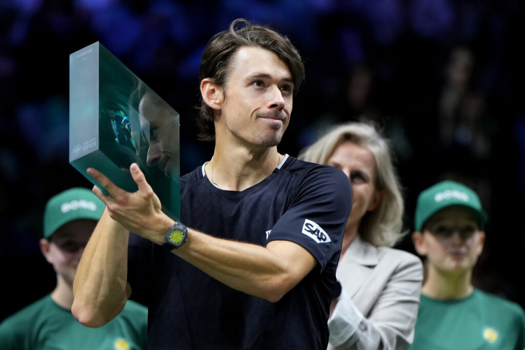 Alex de Minaur of Australia holds the winners trophy after defeating Felix Auger-Aliassime of Canada in the ABN AMRO Open Mens Singles Final at Rotterdam Ahoy on February 15, 2026 in Rotterdam, Netherlands.