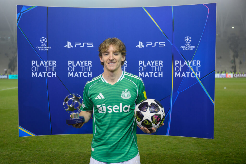 Anthony Gordon of Newcastle United is seen with Player of The Match trophy during the UEFA Champions League 2025/26 League Knockout Play-off First Leg match between Qarabag FK and Newcastle United FC at Tofiq Bahramov Stadium.