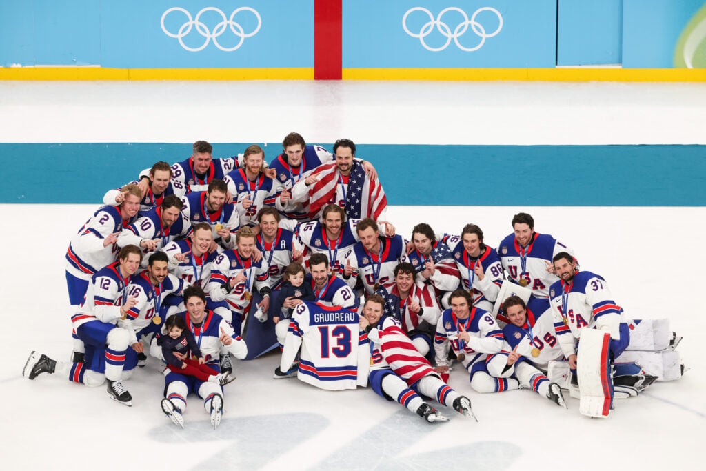 Gold medalist Team United States pose for photograph during the medal ceremony following the Men's Gold Medal match between Canada and the United States on day 16 of the Milano Cortina 2026 Winter Olympic games at Milano Santagiulia Ice Hockey Arena on February 22, 2026 in Milan, Italy.