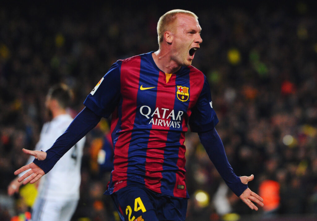 Jeremy Mathieu of Barcelona celebrates as he scores their first goal with a header during the La Liga match between FC Barcelona and Real Madrid CF at Camp Nou.