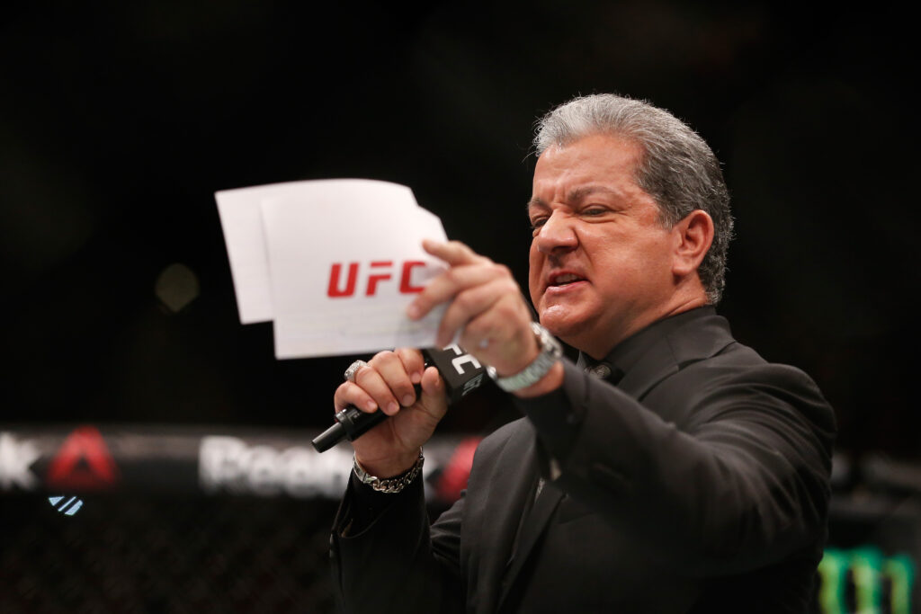 Octagon Announcer Bruce Buffer introduces UFC welterweight championship bout between Jose Aldo of Brazil and Conor McGregor or Ireland during the UFC 194 event inside MGM Grand Garden Arena.