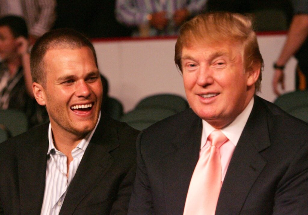 New England Patriots quarterback Tom Brady chats with Donald Trump.