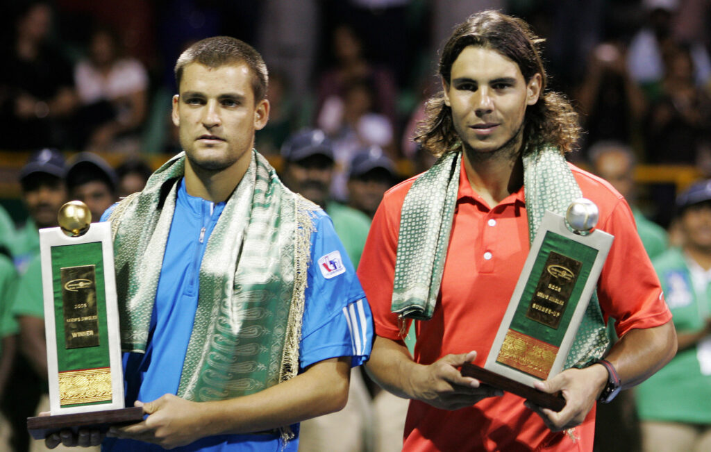 Spanish tennis player Rafael Nadal (R) a