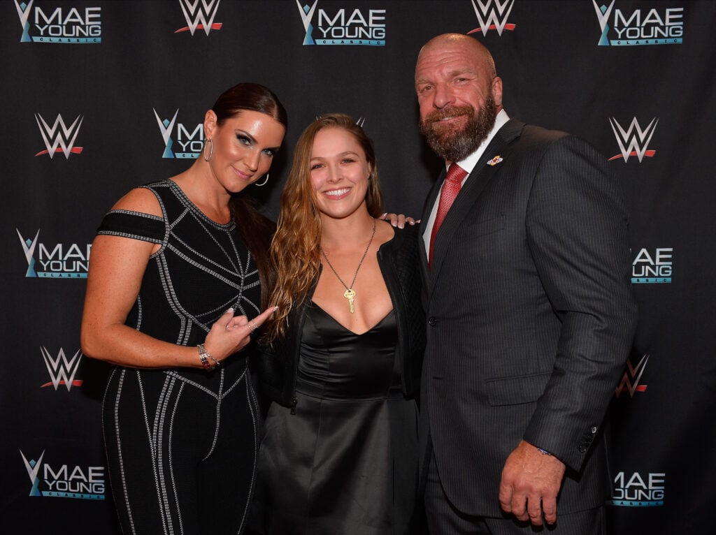WWE Chief Brand Officer Stephanie McMahon, MMA fighter Ronda Rousey and WWE Executive Vice President of Talent, Live Events and Creative Paul "Triple H" Levesque appear on the red carpet of the WWE Mae Young Classic on September 12, 2017 in Las Vegas, Nevada.