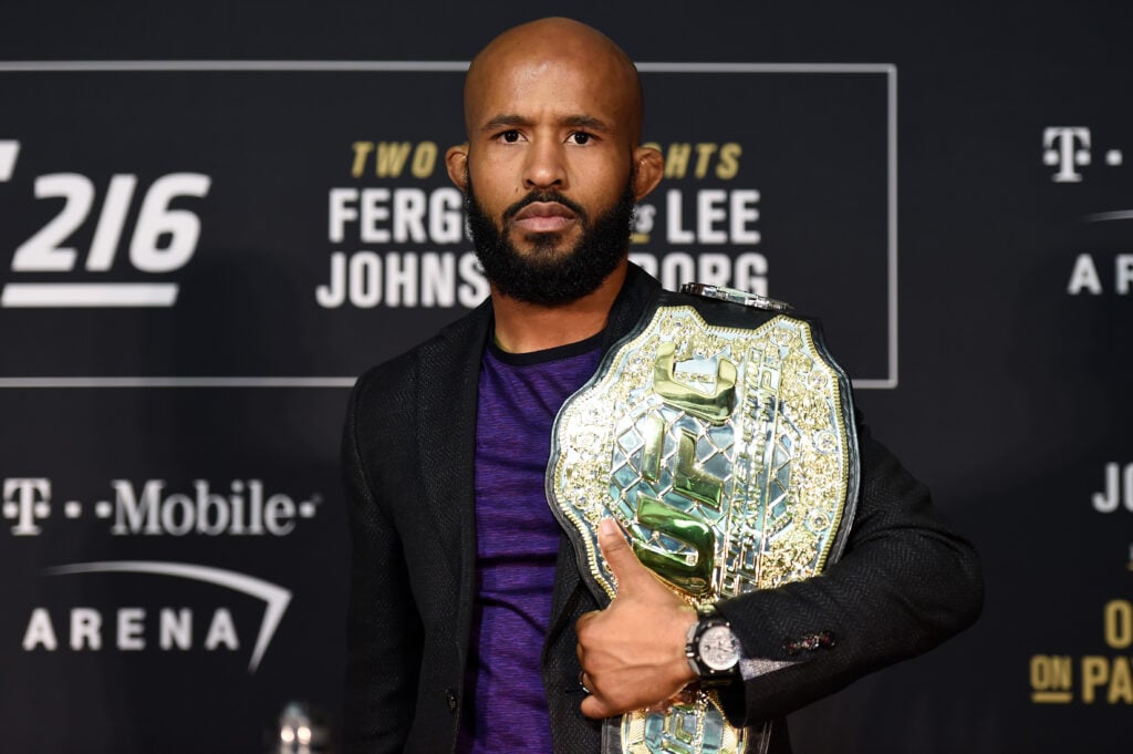 UFC featherweight champion Demetrious Johnson poses for a picture during the UFC 216 event inside TMobile Arena.