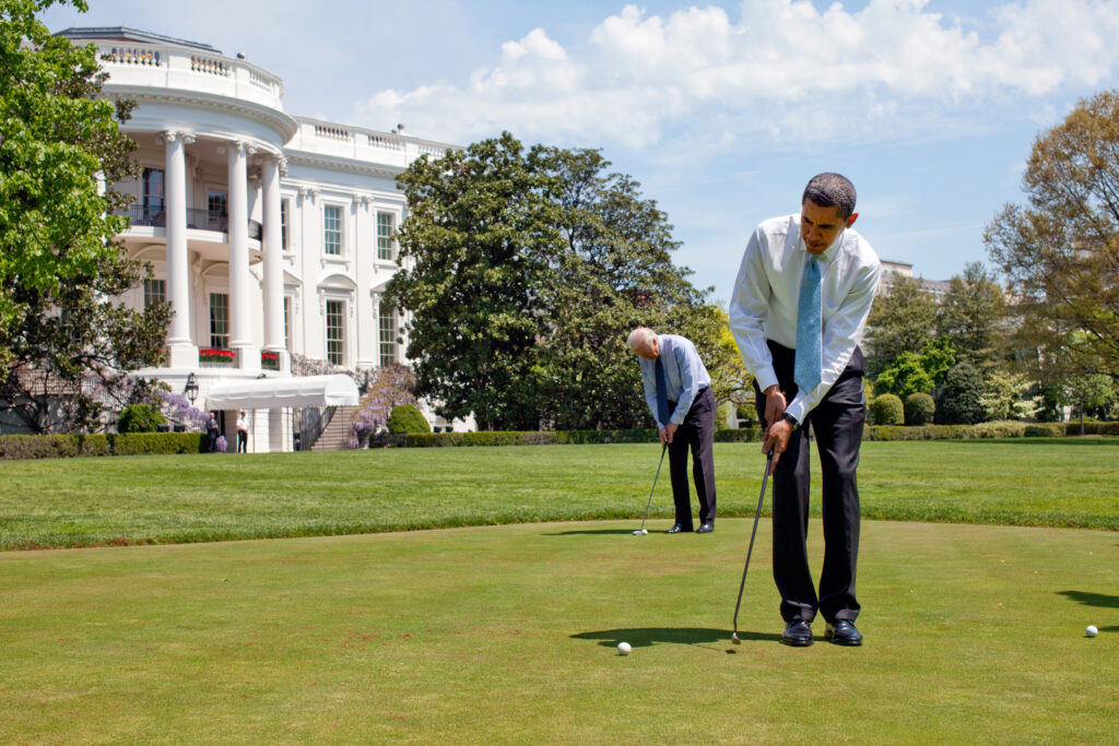 U.S. President Barack Obama and U.S. Vice President Joe Biden putt on the White House putting green April 24, 2009
