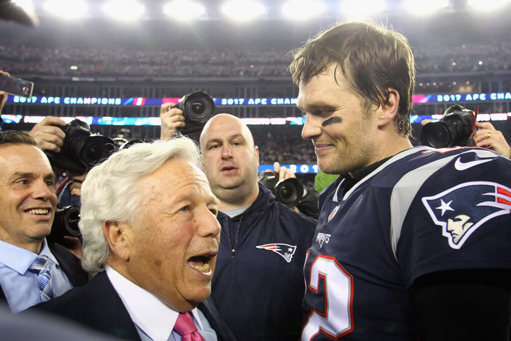 Tom Brady #12 of the New England Patriots celebrates with owner Robert Kraft after winning the AFC Championship Game against the Jacksonville Jaguars at Gillette Stadium on January 21, 2018 in Foxborough, Massachusetts.