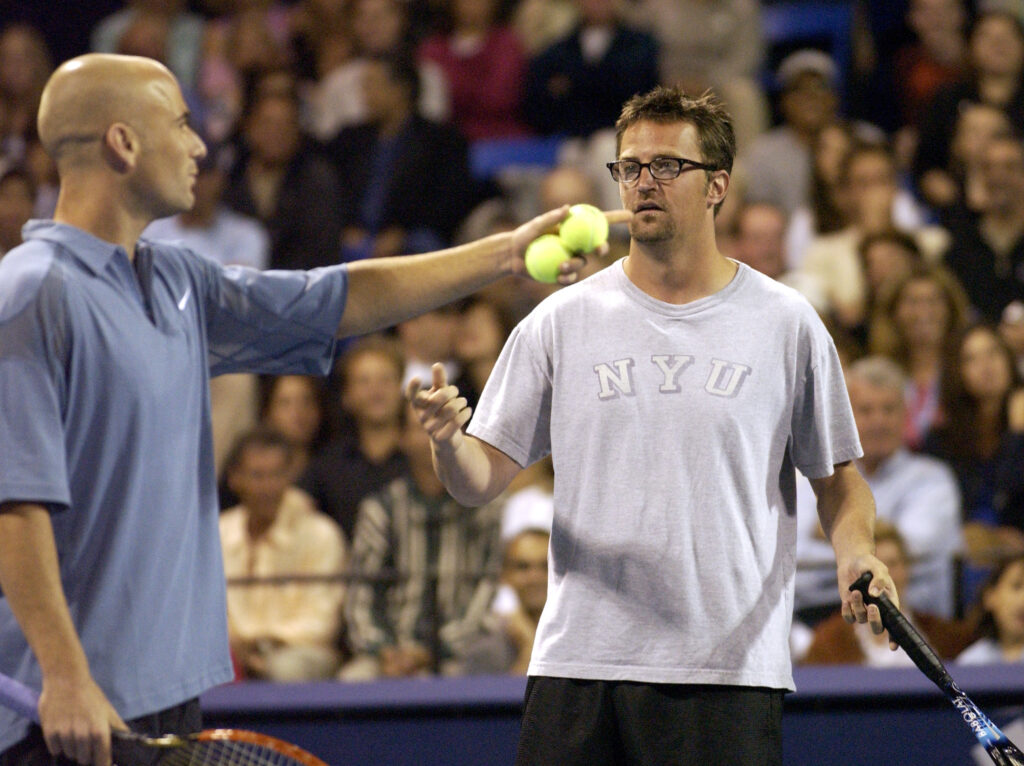 Andre Agassi and Matthew Perry in action.