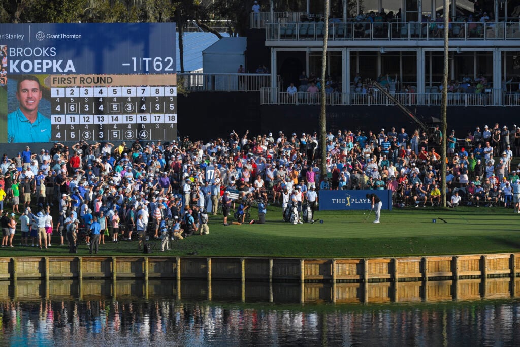 Brooks Koepka hits a tee shot on the 17th hole during the first round of THE PLAYERS Championship on THE PLAYERS Stadium Course at TPC Sawgrass