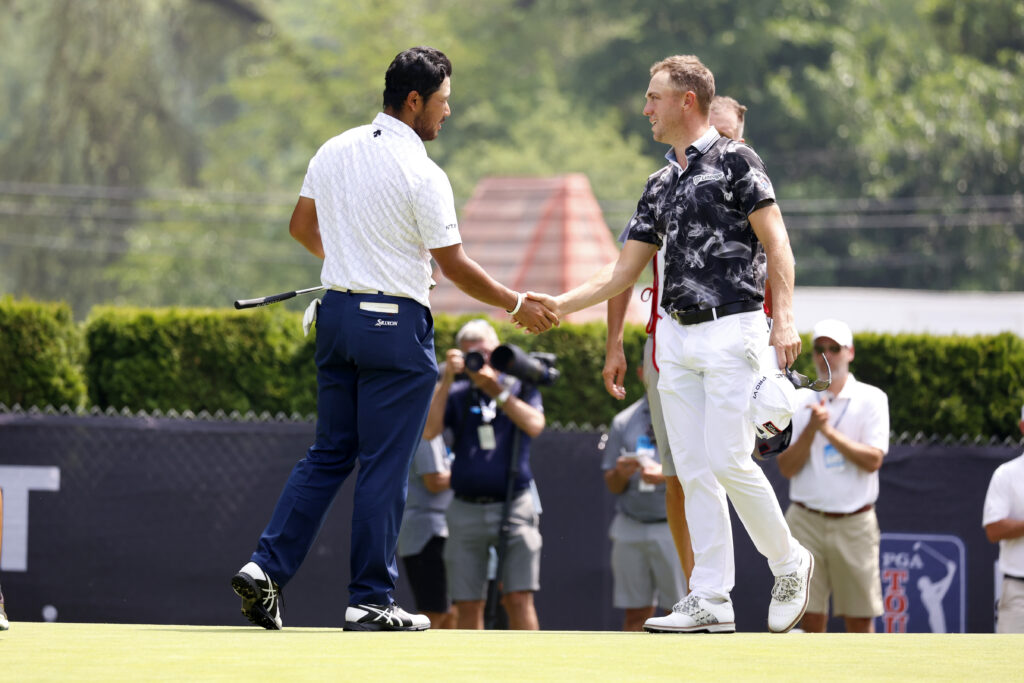 Hideki Matsuyama with Justin Thomas during the second round of the Rocket Mortgage Classic