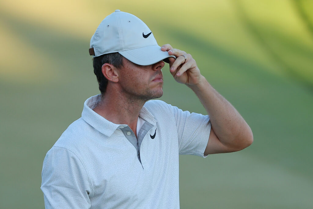 Rory McIlroy of Northern Ireland reacts to his missed up on the 18th green during the third round of the Arnold Palmer Invitational