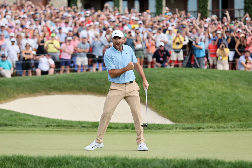Scottie Scheffler celebrates making the putt to win The Memorial Tournament