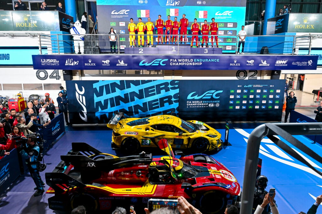 Second place AF Corse team members Yifei Ye, Robert Kubica, and Philip Hanson, third place Ferrari AF Corse team members Alessandro Pier Guidi, James Calado, and Antonio Giovinazzi, and winners Ferrari AF Corse team members Antonio Fuoco, Miguel Molina, and Nicklas Nielsen celebrate on the podium at the Qatar 1812KM World Endurance Championship race at Losail International Circuit in Doha, Qatar, on February 28, 2025.