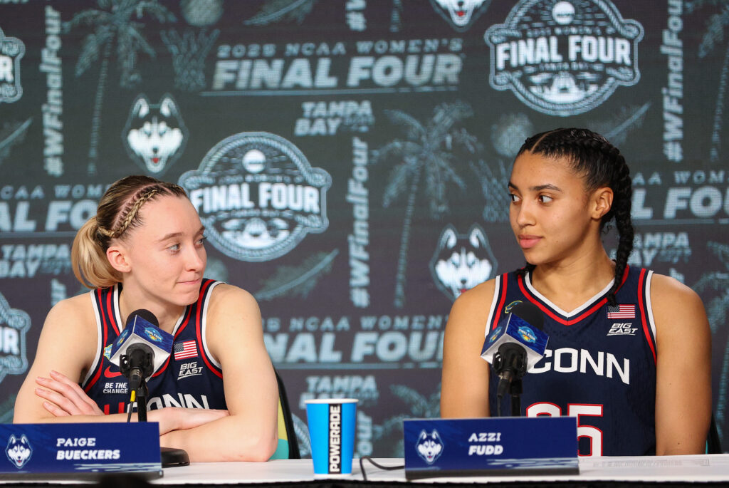 UConn Huskies guard Paige Bueckers (5) and UConn Huskies guard Azzi Fudd (35) speaks with the media at the conclusion of the 2025 NCAA Div I Women's Championship Final Four game between UConn Huskies and UCLA Bruins on April 4, 2025, at Amalie Arena.