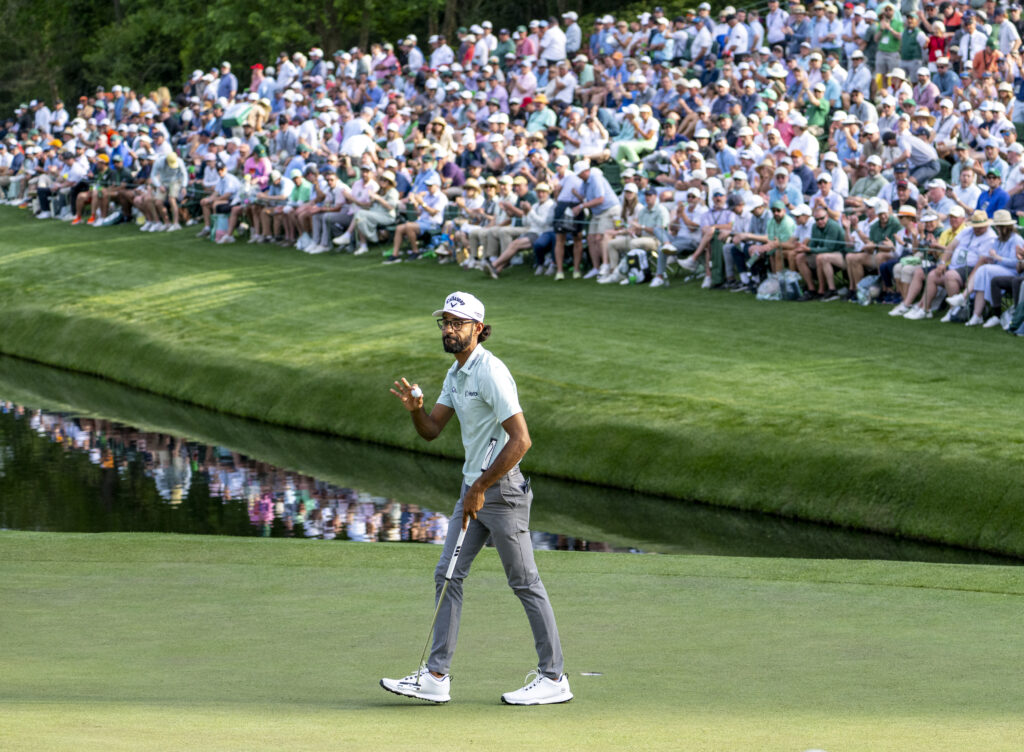 Akshay Bhatia acknowledges the crowd during the first round of The Masters