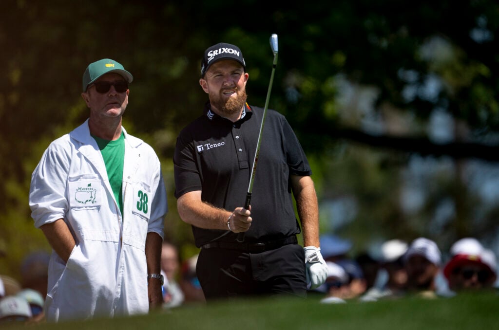Shane Lowry of Ireland and his caddie Darren Reynolds on the No. 3 tee during the final round of the Masters at Augusta National