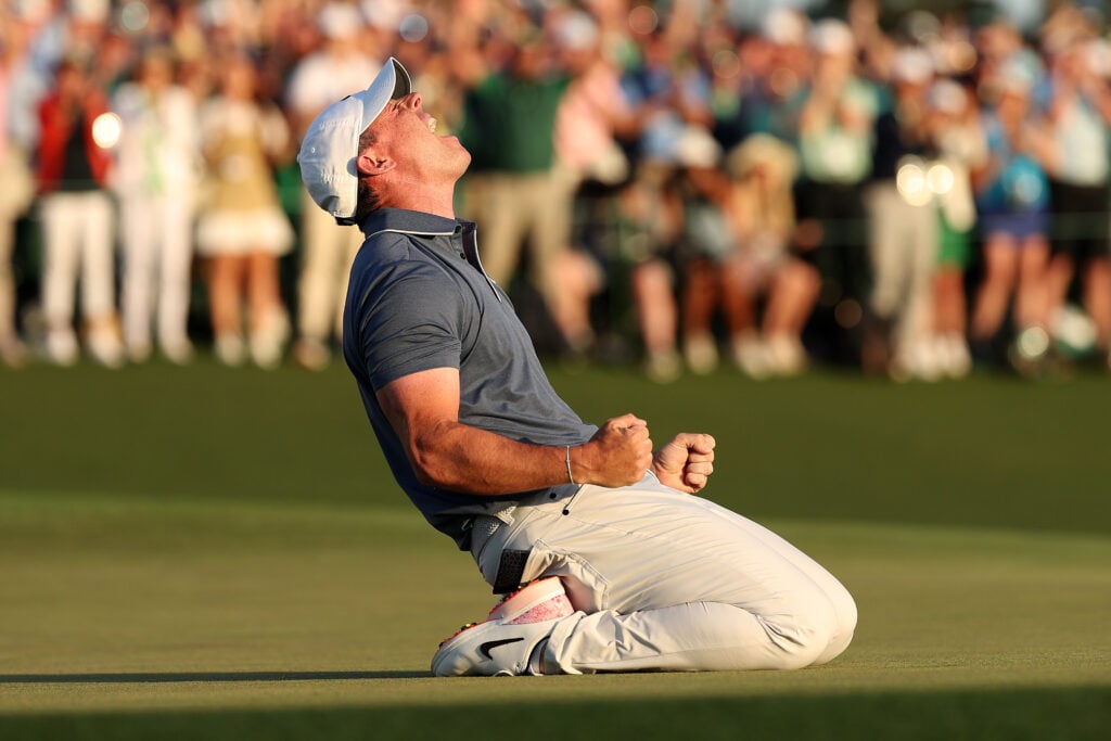 Rory McIlroy of Northern Ireland celebrates winning the 2025 Masters Tournament after the first playoff hole on the 18th green at Augusta National Golf Club on April 13, 2025 in Augusta, Georgia.