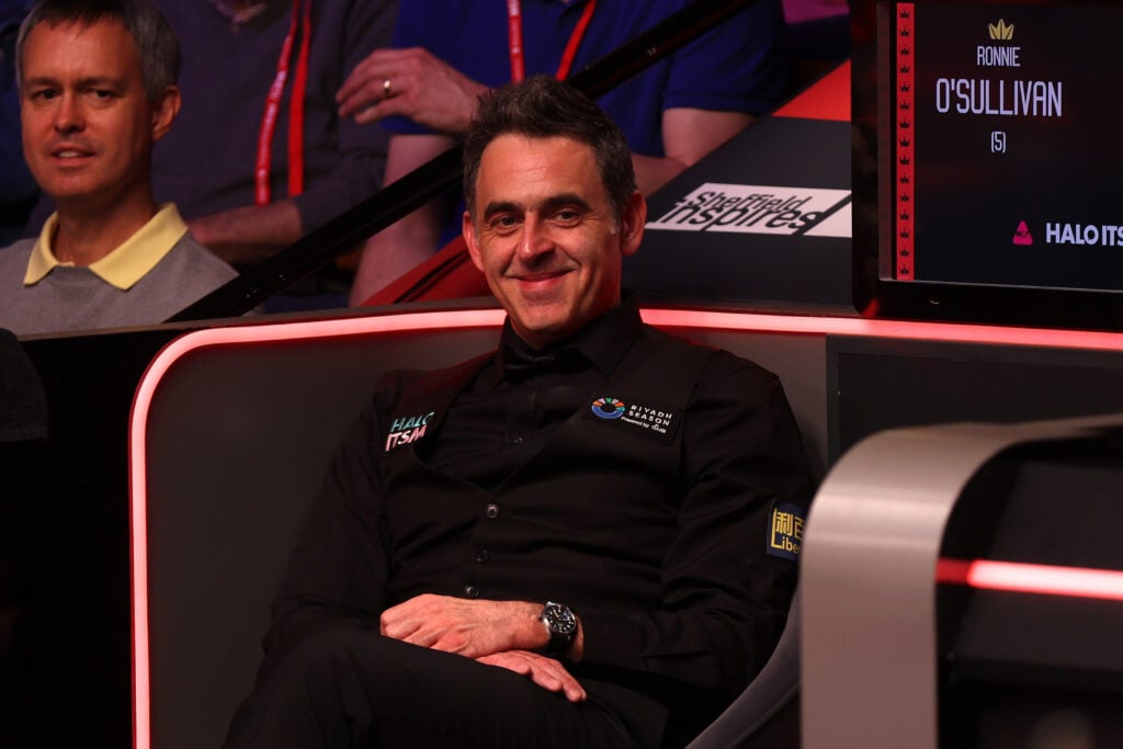 Ronnie O'Sullivan of England reacts against Pang Junxu of China during the second round match on day nine of the Halo World Snooker Championship 2025 at Crucible Theatre on April 27, 2025 in Sheffield, England.