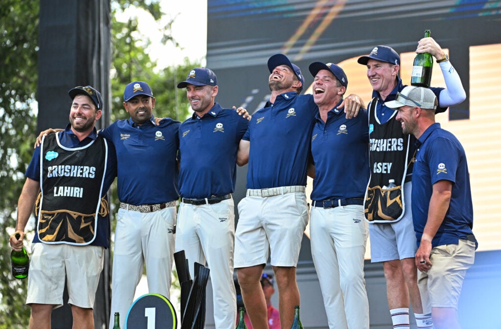 Anirban Lahiri, Charles Howell III, Bryson DeChambeau and Paul Casey of Crushers GC celebrate after winning the team championship at LIV Golf Dallas
