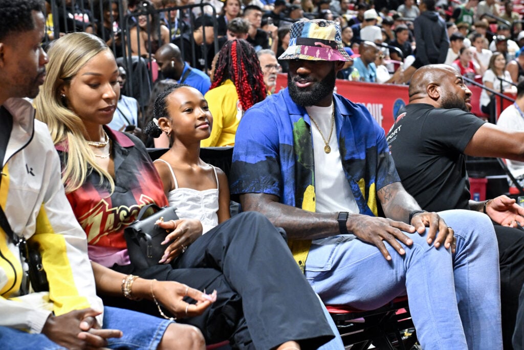 Savannah James, Zhuri James and LeBron James attend the 2025 NBA Summer League game between the Los Angeles Clippers and the Los Angeles Lakers at the Thomas & Mack Center.