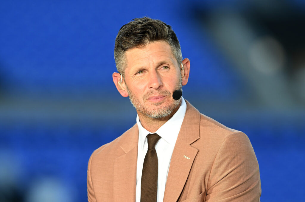 ESPN Broadcaster Dan Orlovsky speaks before the game between the Baltimore Ravens and the Detroit Lions
