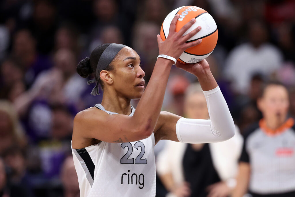 A'ja Wilson #22 of the Las Vegas Aces attempts a free throw during Game Four of the 2025 WNBA Playoffs finals against the Phoenix Mercury at Mortgage Matchup Center.
