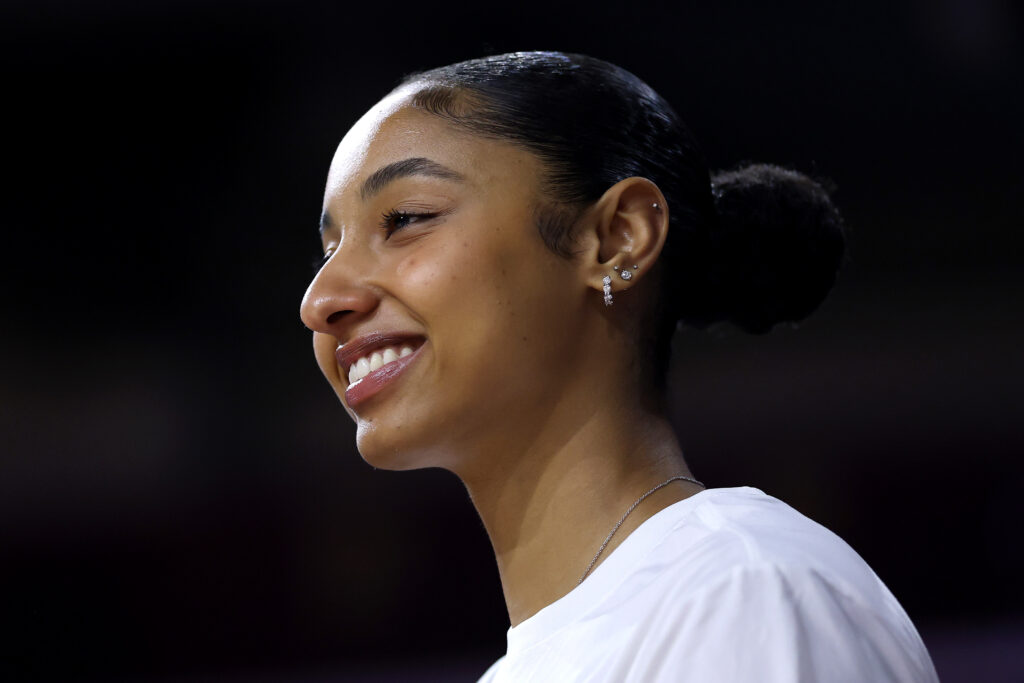 Juju Watkins #12 of the USC Trojans looks on before the game against the UConn Huskies at Galen Center.
