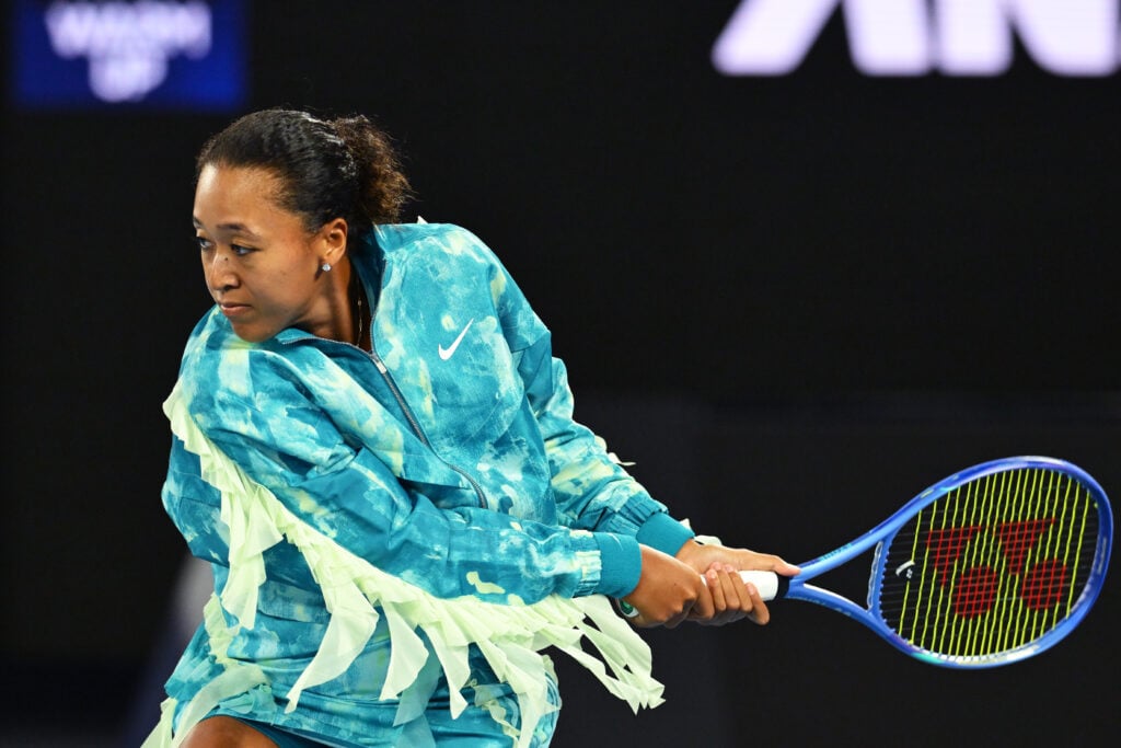 Naomi Osaka of Japan warms up in a custom outfit ahead of the Women's Singles First Round match against Antonia Ruzic of Croatia on day three of the 2026 Australian Open at Melbourne Park on January 20, 2026 in Melbourne, Australia.