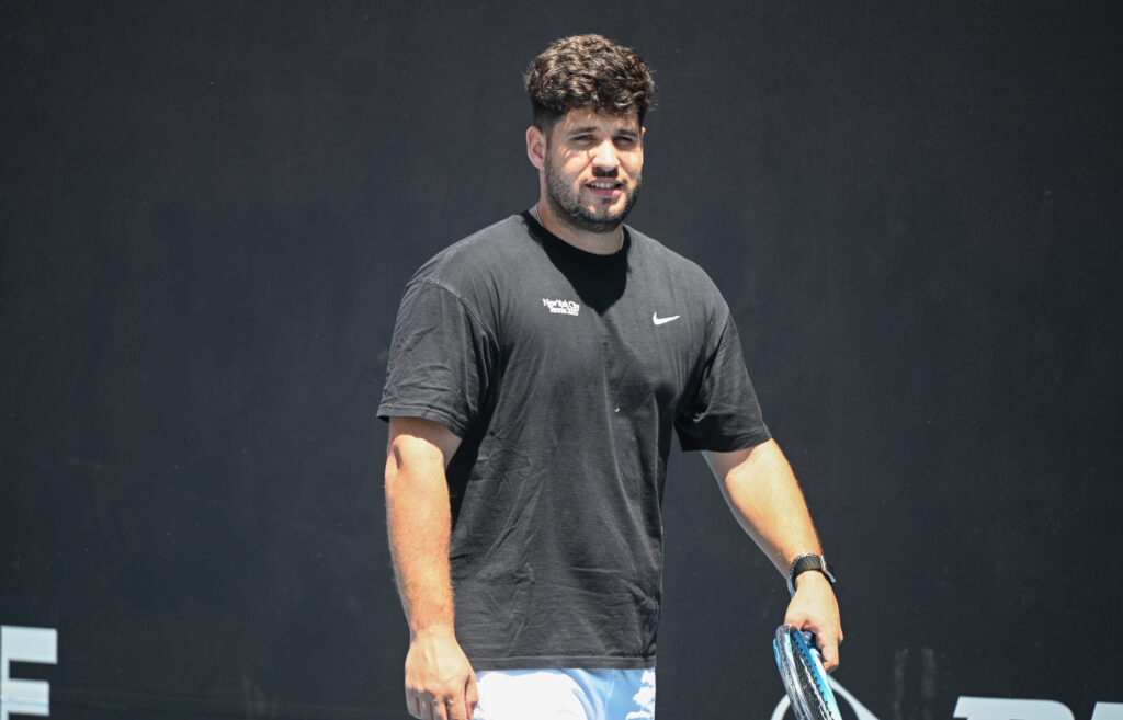 Alvaro Alcaraz on court at the 2026 Australian Open during brother Carlos Alcaraz's practice session.
