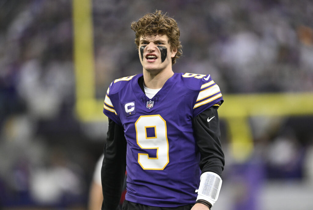 J.J. McCarthy #9 of the Minnesota Vikings warms up before the game against the Green Bay Packers at U.S. Bank Stadium.